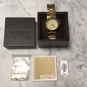 Michael Kors women’s gold watch